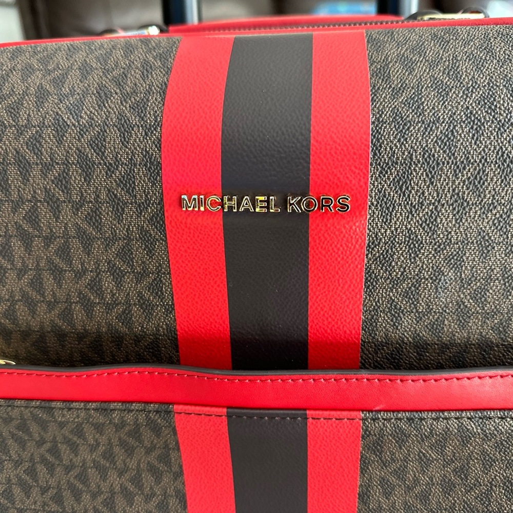 Michael Kors suitcase.